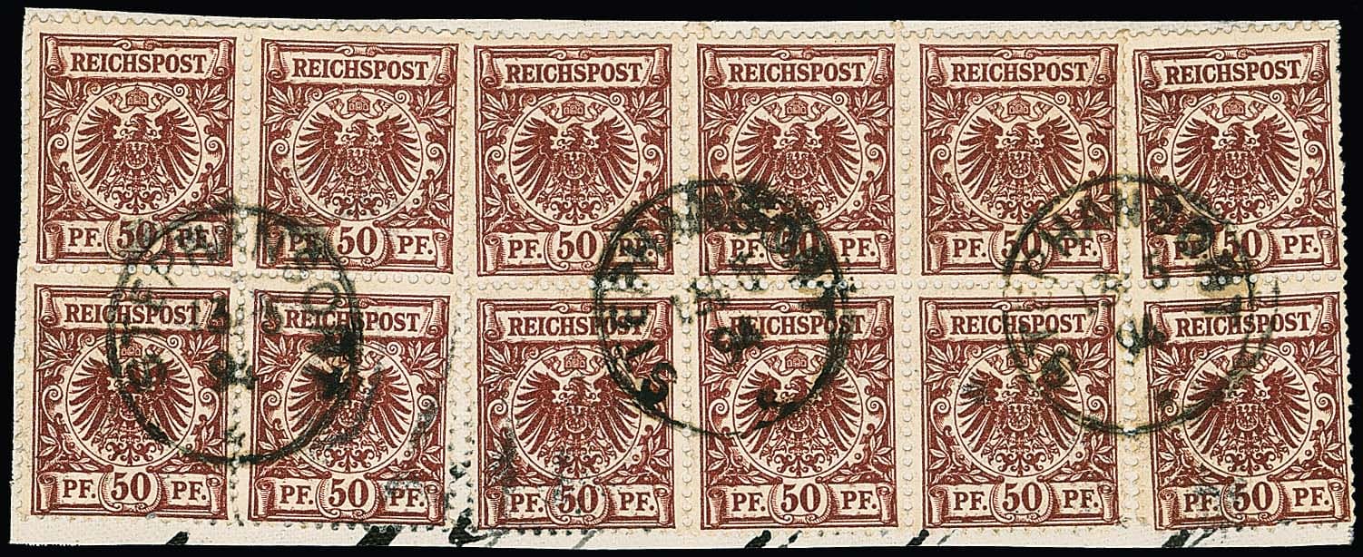 Los 2982 - Vorläufer Krone-Adler 50 Pfg. bräunlichrot per 12 (dabei zwei Viererblöcke) auf Briefstück mit K1 "Stephansort" 1894, zwei Marken kleine Zahnfehler, Mi. lose 1200,-